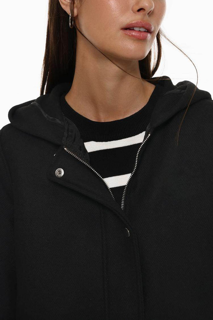 Close-up front view of black wool coat

