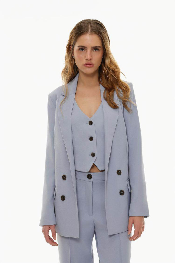 Front view of women's blue basic blazer

