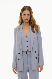Front view of women's blue basic blazer

