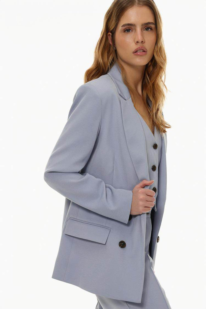 Side view of the women's blue basic blazer

