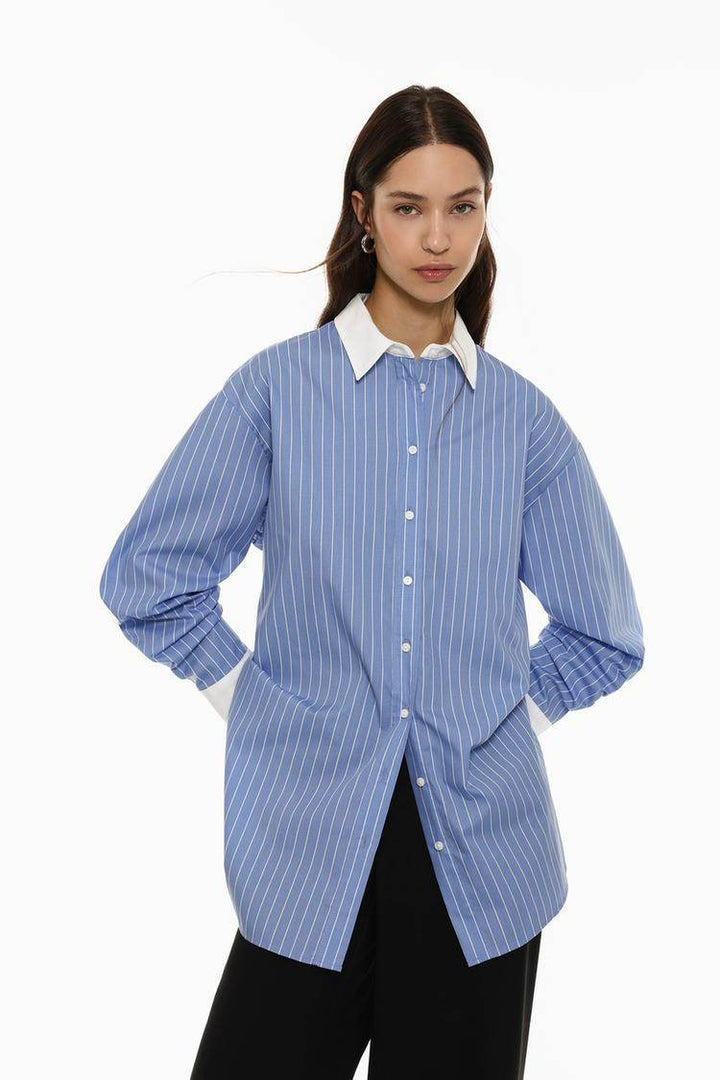 Front view of women's blue oversized shirt

