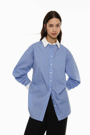 Front view of women's blue oversized shirt

