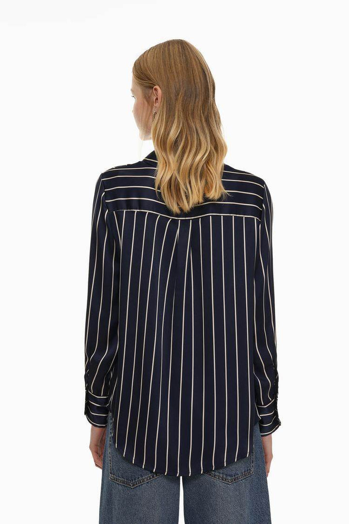 Back view of the women's blue satin shirt

