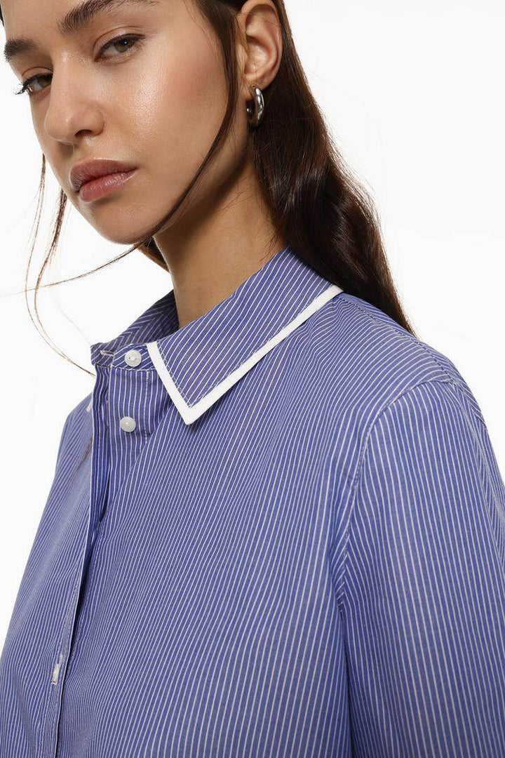 Close-up front view of blue striped shirt

