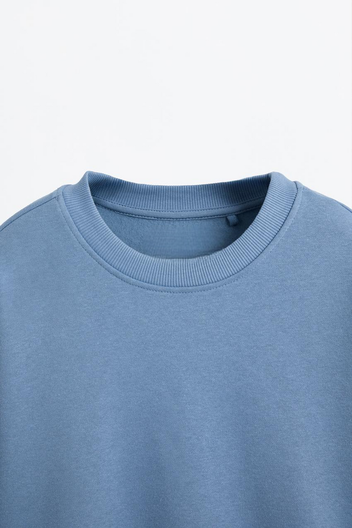 Zoomed front view of a blue women's sweatshirt
