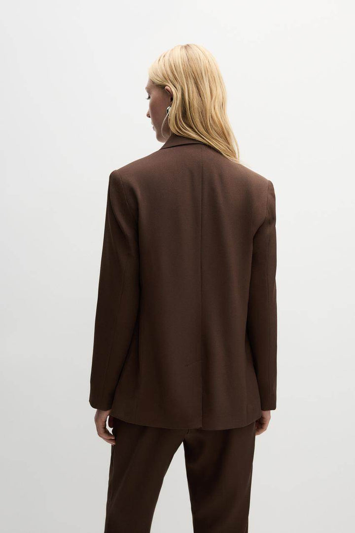 Back view of the brown blazer

