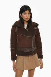 Front view of women's brown double-faced crossover jacket

