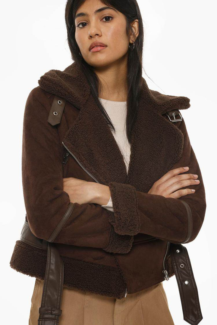 Model showcasing brown double-faced crossover jacket


