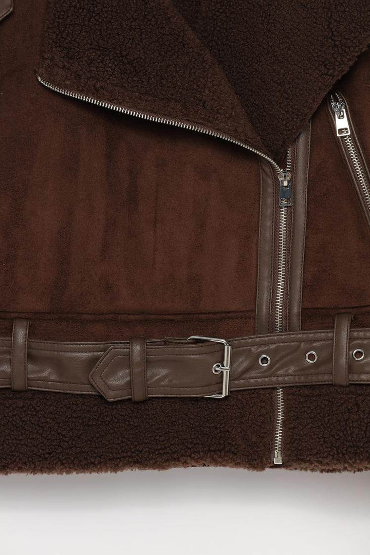 Close-up product image of brown crossover jacket

