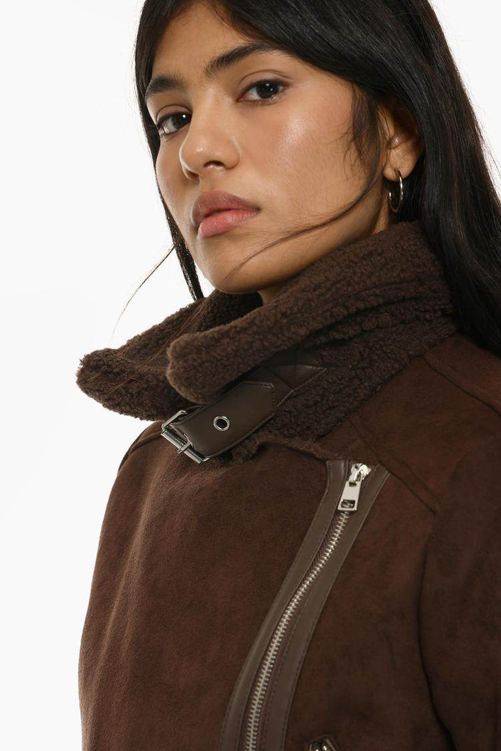 Side view of the women's brown double-faced crossover jacket

