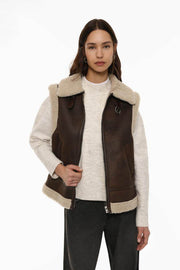 Front view of women's brown double-faced gilet with zip

