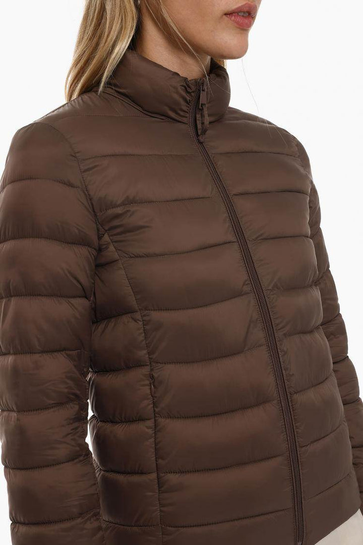 Close-up front view of brown lightweight puffer jacket

