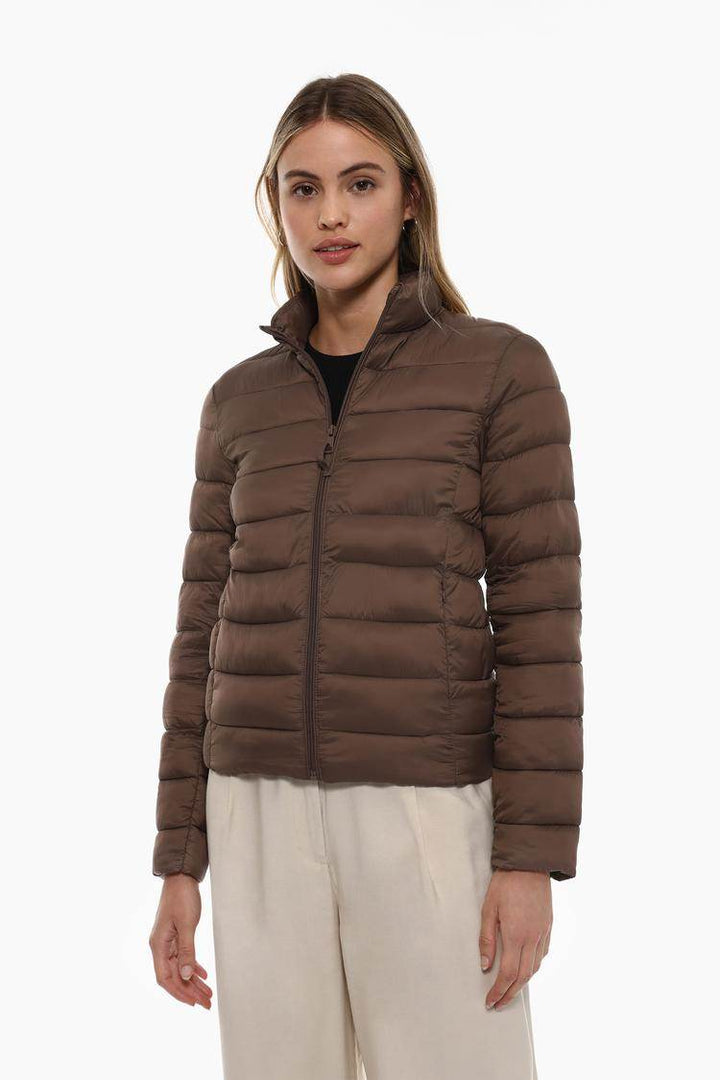 Front view of women's brown lightweight puffer jacket

