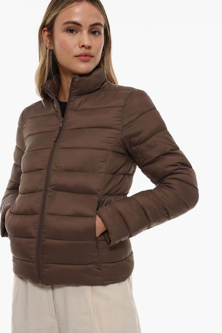 Side view of the women's brown lightweight puffer jacket

