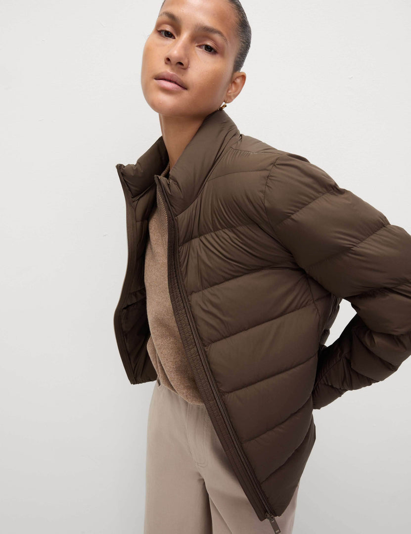 Front view of the women's brown puffer jacket

