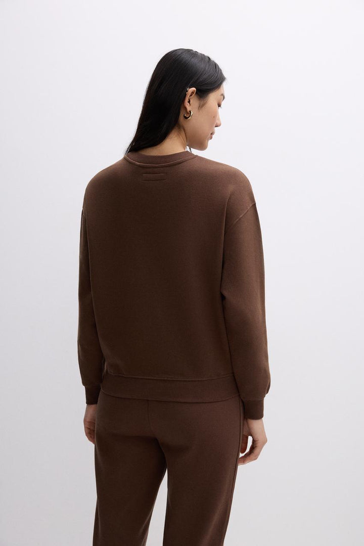 Back view of a brown women's sweatshirt
