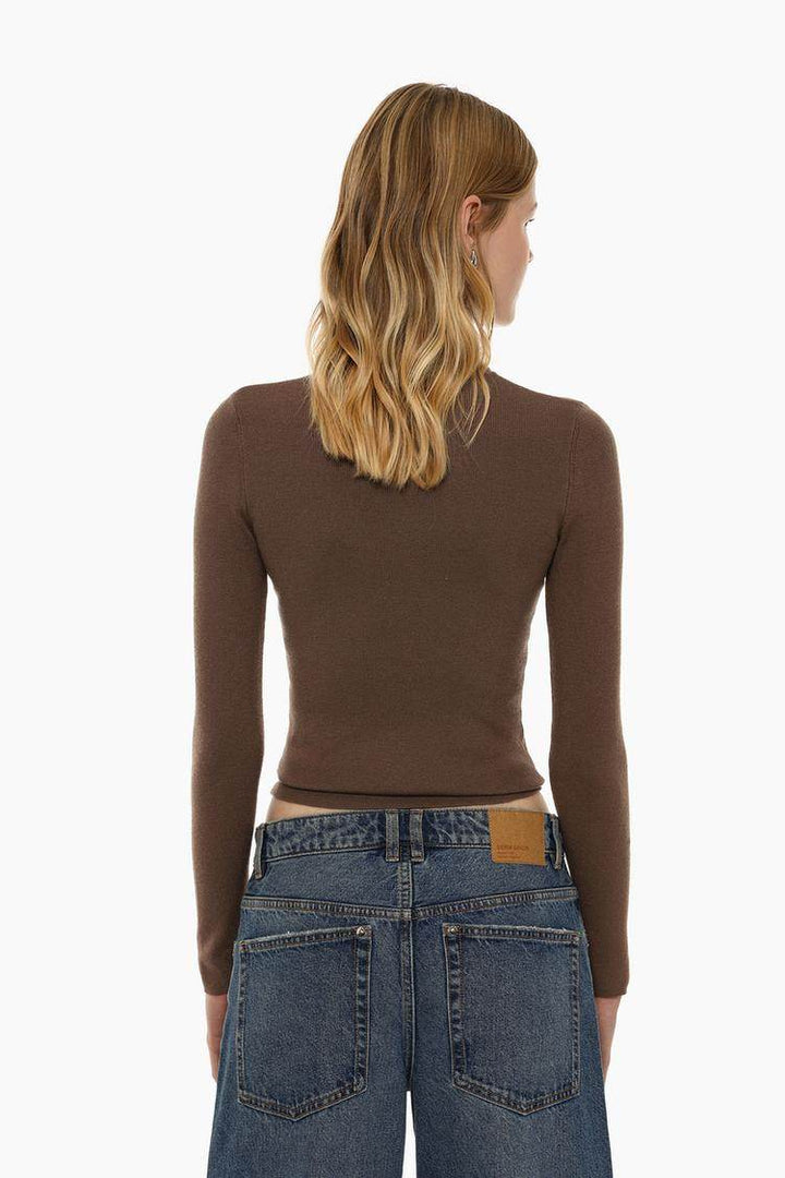 Back view of the women's brown turtleneck sweater

