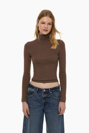 Front view of women's brown turtleneck sweater

