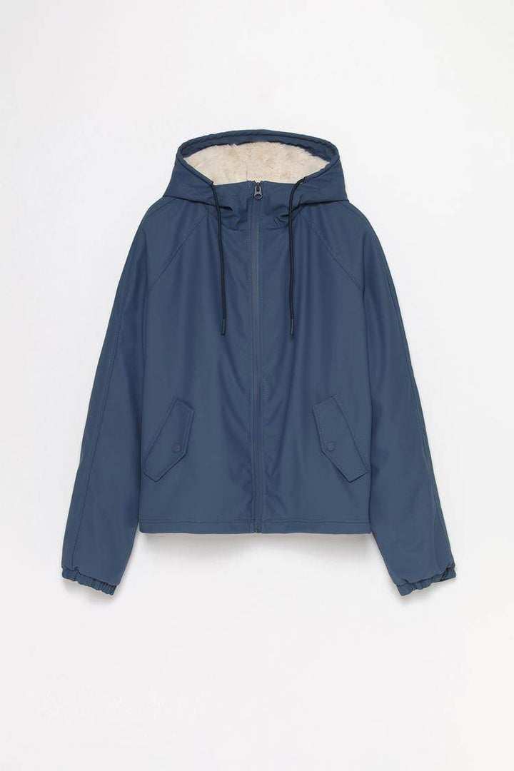Dark blue rubberised parka with faux fur lining for women


