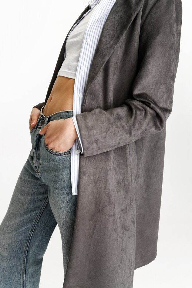 Full side view of the dark green faux suede coat

