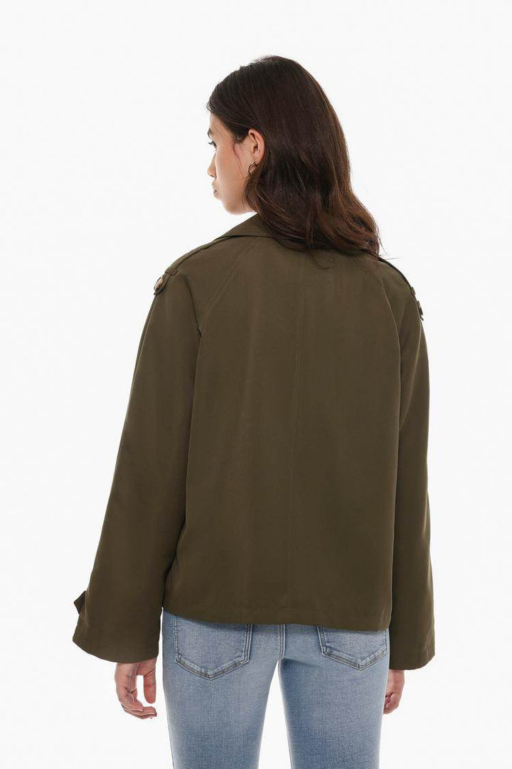 Back view of the women's dark green short oversize trench coat

