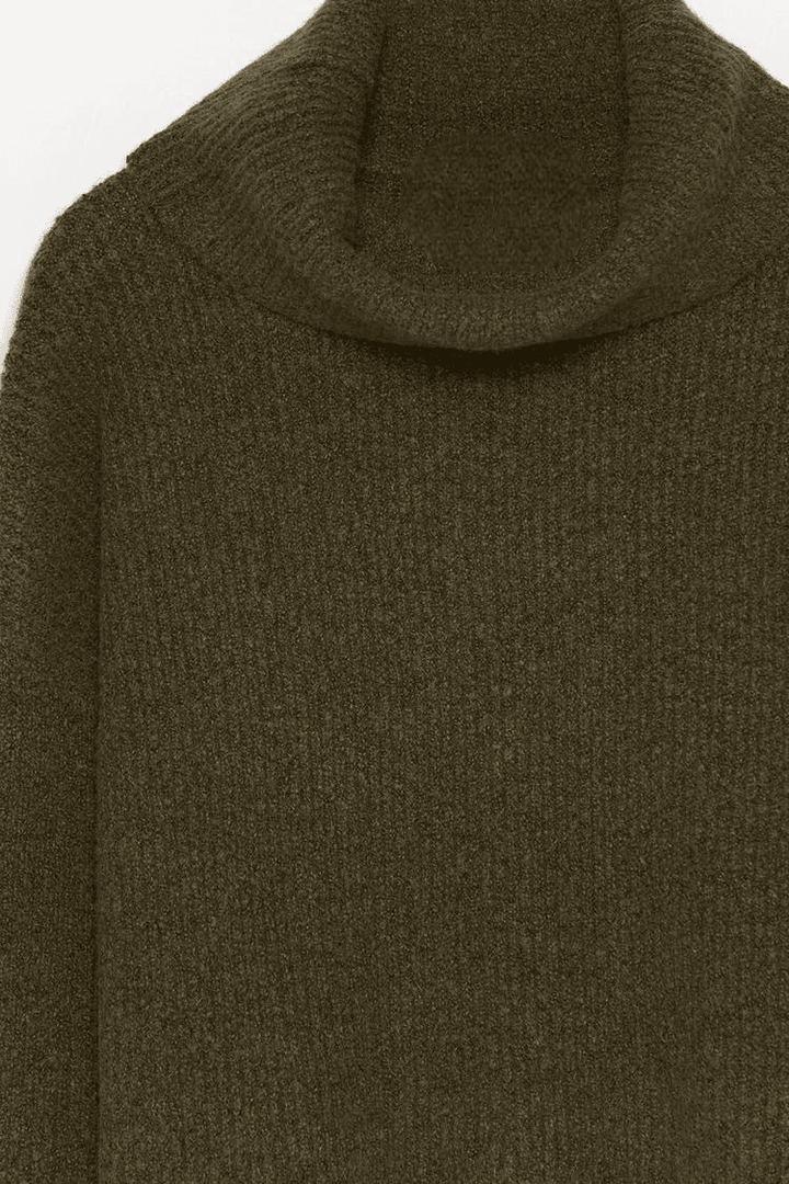 Close-up product image of dark green turtleneck sweater


