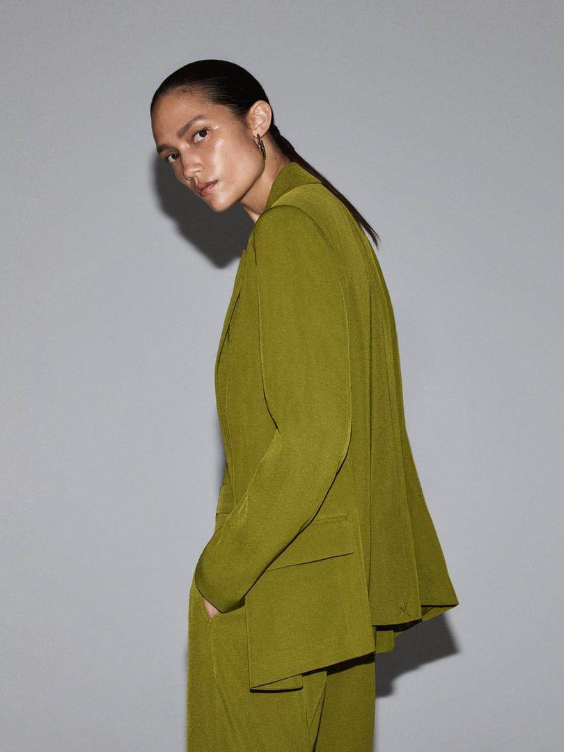 Side view of the green blazer

