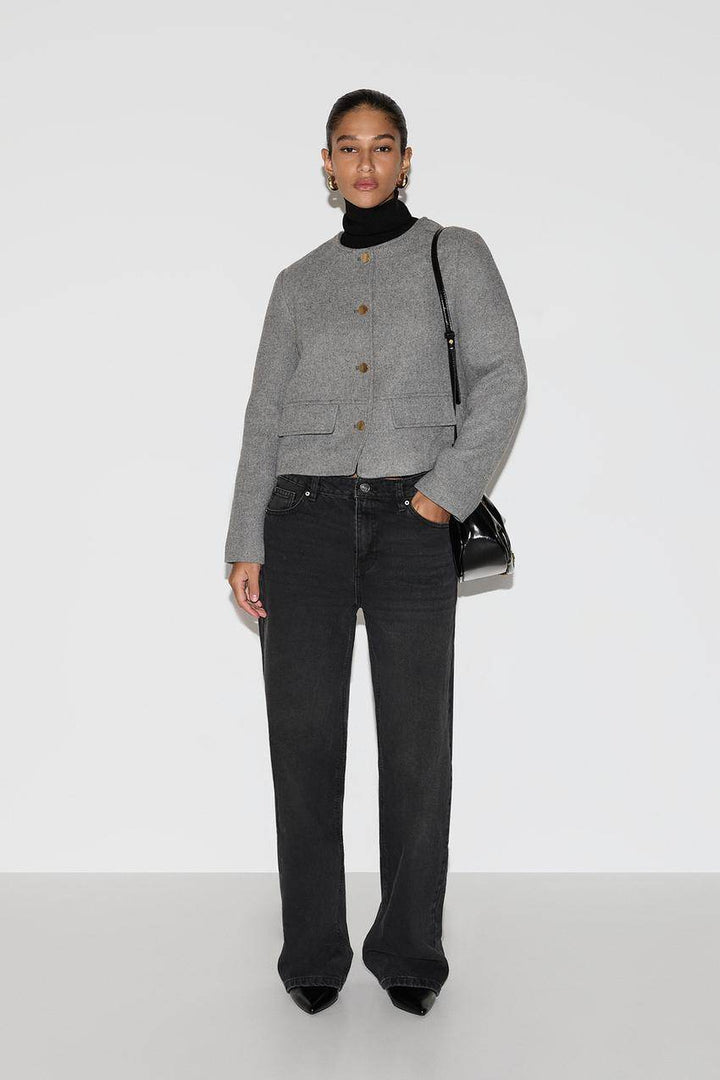 Front full body view of a grey women's cloth jacket
