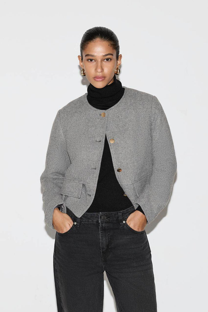 Front view of a grey women's cloth jacket
