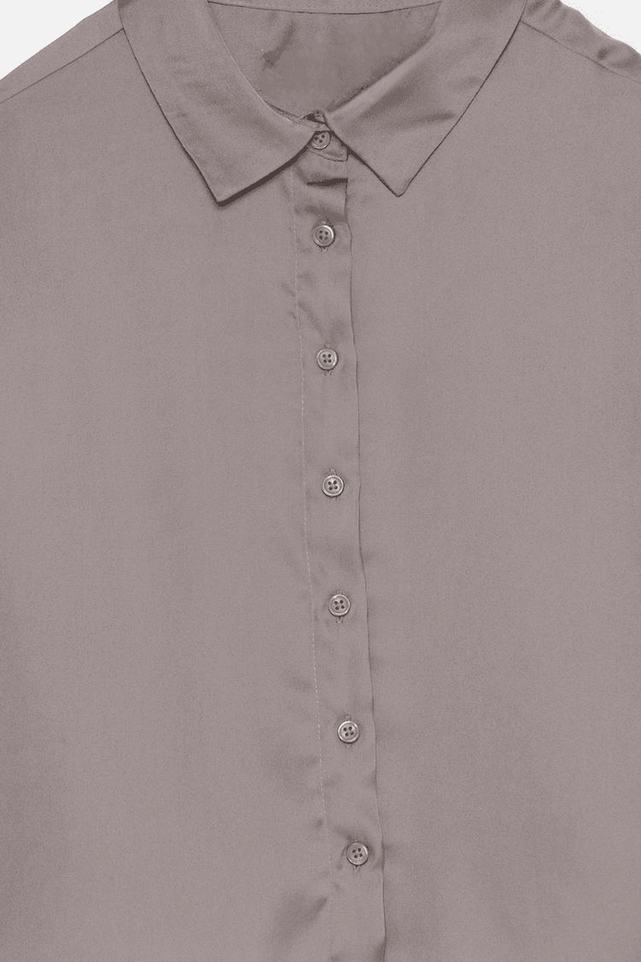 Close-up product image of grey satin shirt fabric

