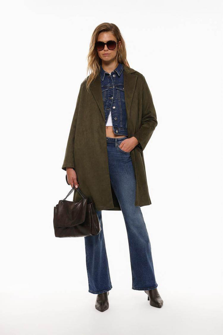 Full body front view of woman wearing grey faux suede coat

