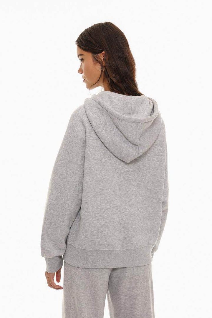 Back view of the women's grey hooded jacket

