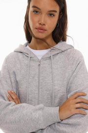 Front view of women's grey hooded jacket

