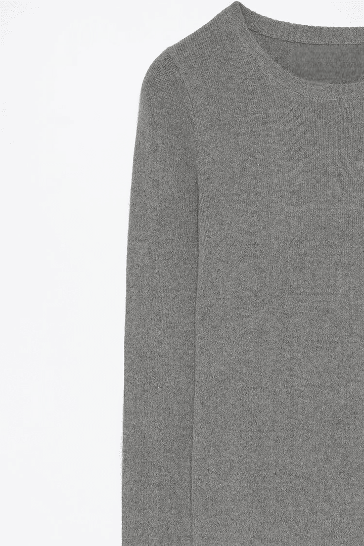 Close-up product image of the grey knit midi dress material

