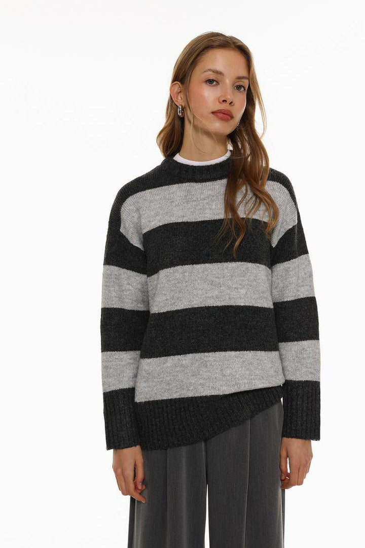 Front view of women's grey long soft sweater

