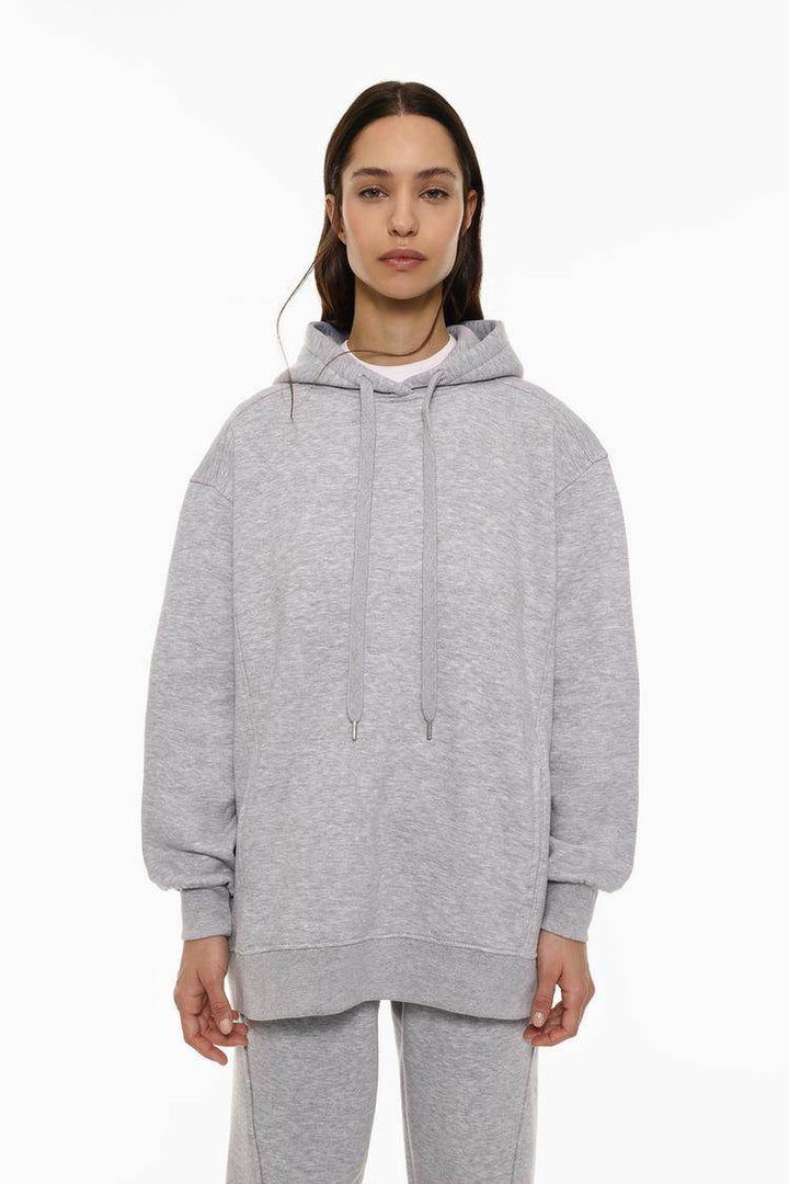 Front view of women's grey oversized plush sweatshirt

