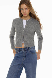 Front view of women's grey rounded neck knit cardigan

