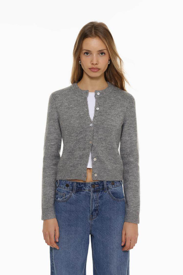 Model showcasing grey rounded neck cardigan front

