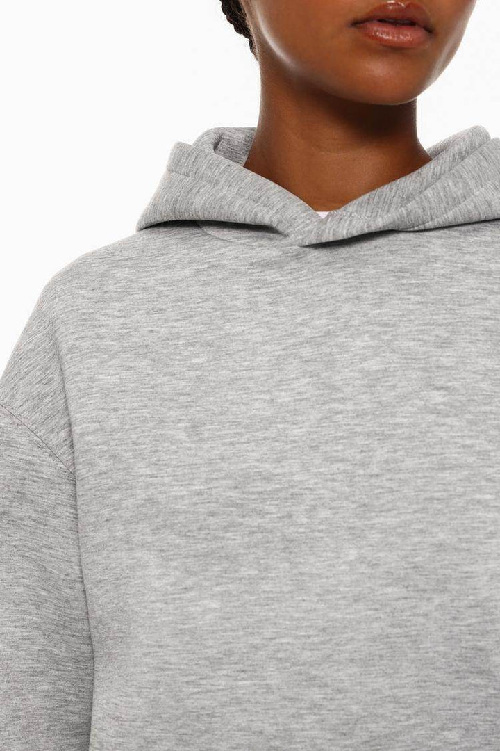 Close-up front view of grey tracksuit hoodie


