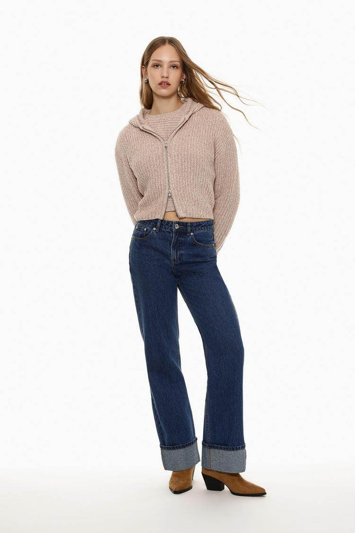 Full body front view of woman wearing khaki chenille jacket

