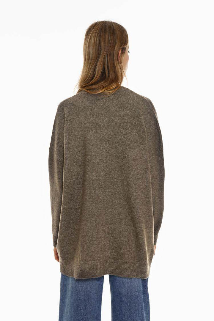 Back view of the women's khaki soft knit oversize jumper

