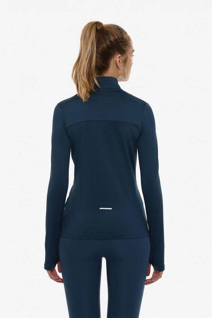 Back view of the women's navy sports jacket

