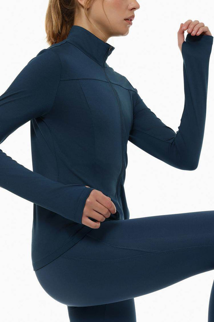 Side view of the women's navy sports jacket

