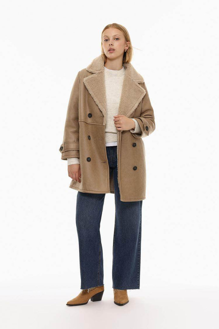 Front view of women's oversize double-breasted double-faced coat

