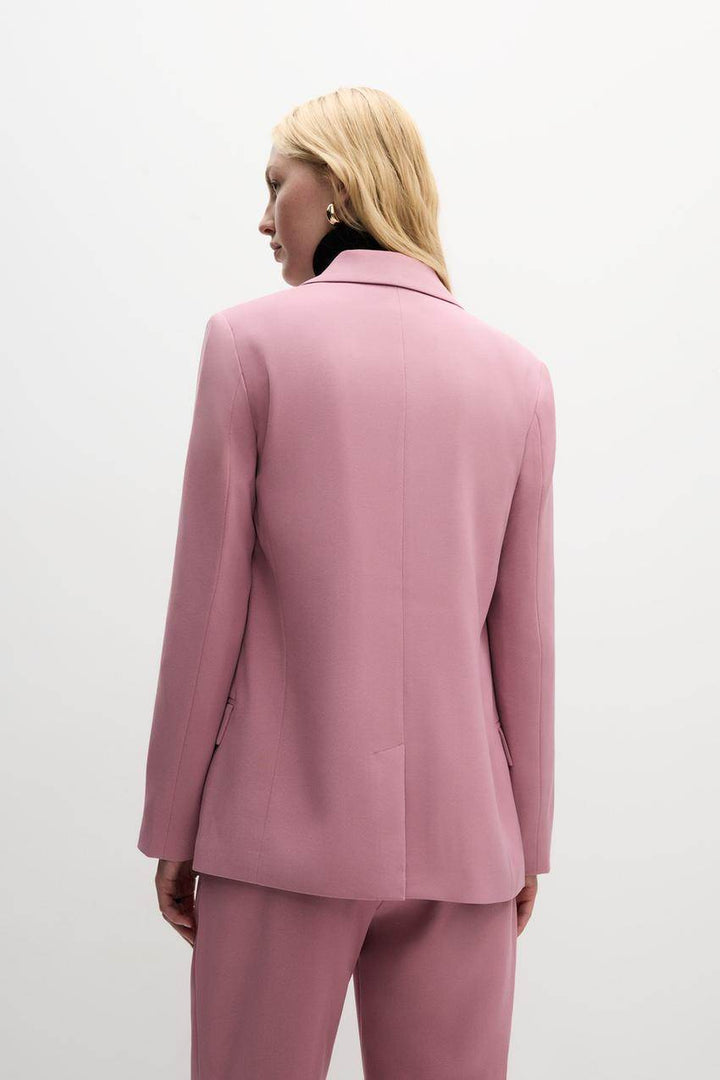 Back view of the pink blazer


