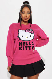 Front view of women's pink Hello Kitty sweater

