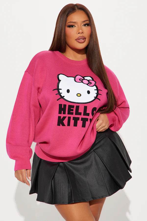 Model showcasing pink Hello Kitty sweater front

