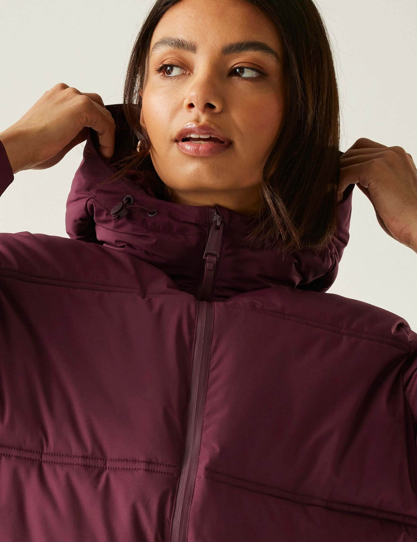 Zoomed in front view of the purple quilted puffer jacket details

