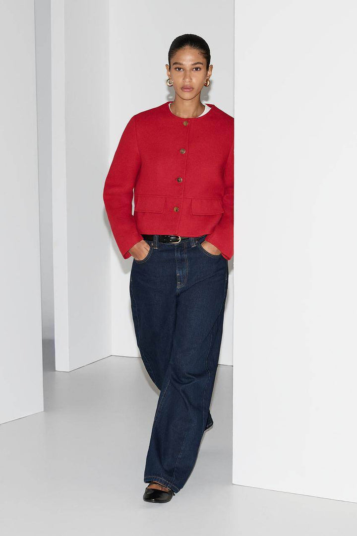 Side view of a red women's cloth jacket
