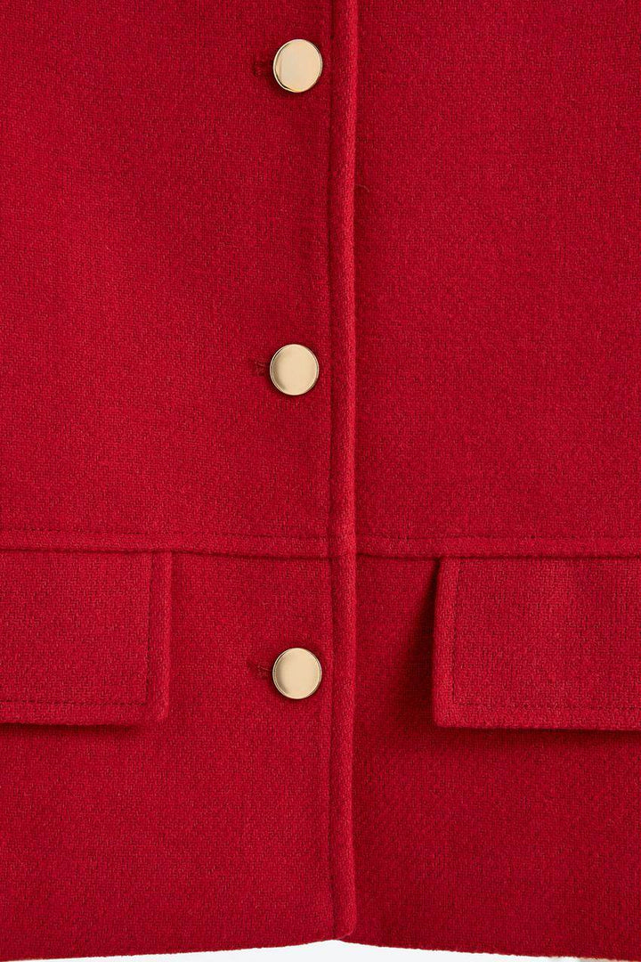 Zoomed view of a red women's cloth jacket
